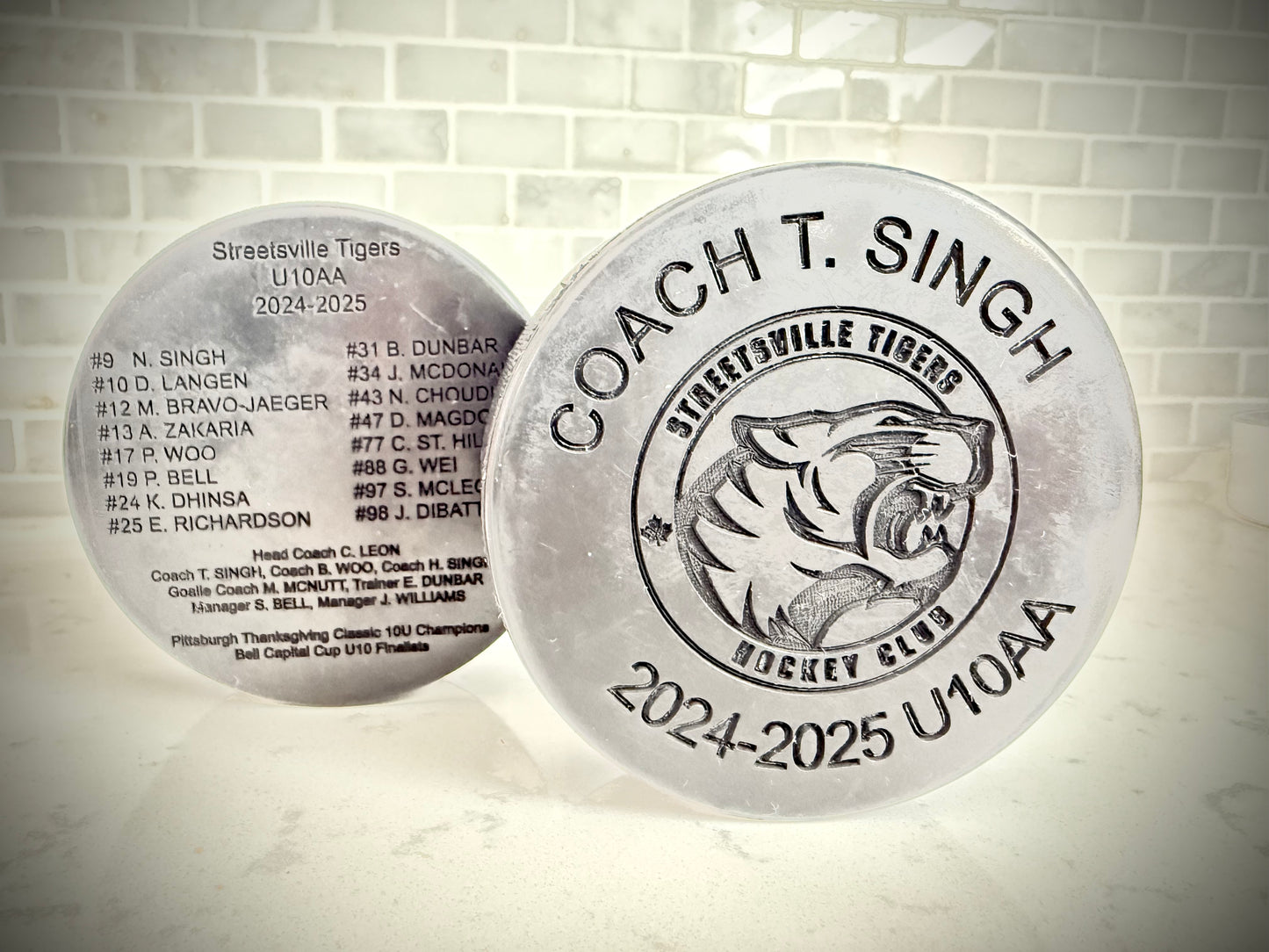Custom Team Hockey Pucks - Laser Engraved